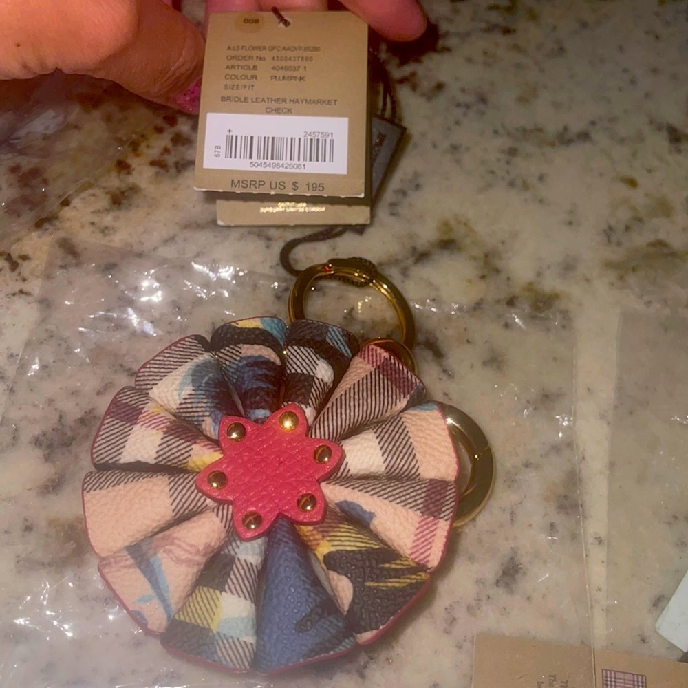 Burberry Flower charm. Plum pink